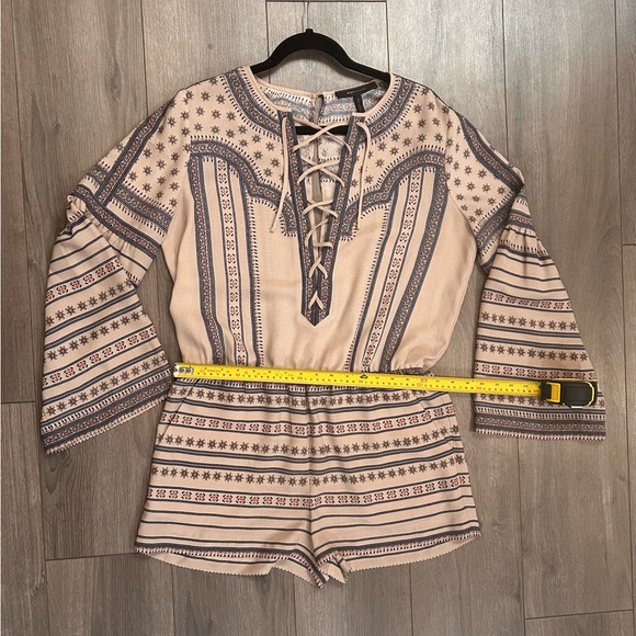 BCBG MaxAzria ROMPER bell sleeves button up back with tie front. - Picture 6 of 7